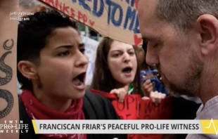 Fr. Fidelis Moscinski, CFR (right) encounters protesters during the July 10 "Witness for Life" prayer procession in Brooklyn. Jeffrey Bruno/Instagram/EWTN Pro-Life Weekly